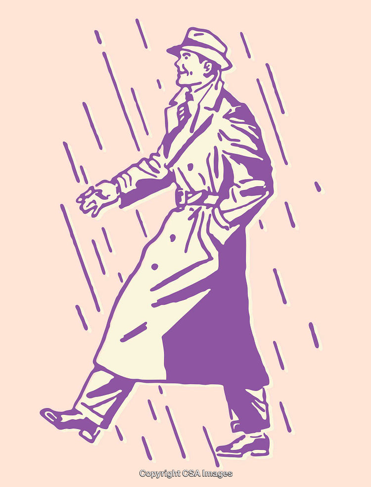 Stylish Man in Trench Coat Walking Through Rainy Scene