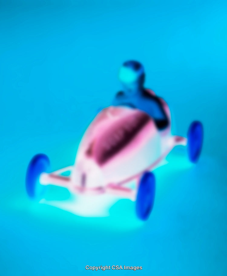 Colorful Toy Car with Person Against a Vibrant Blue Background