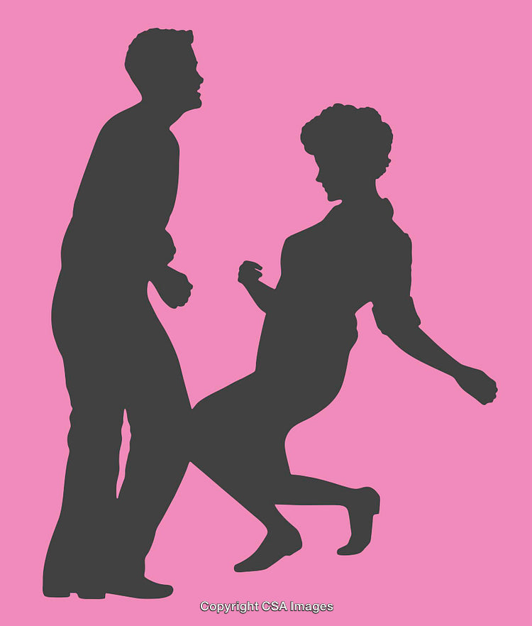 Silhouettes of Two People Dancing in Joyful Motion on Pink Background