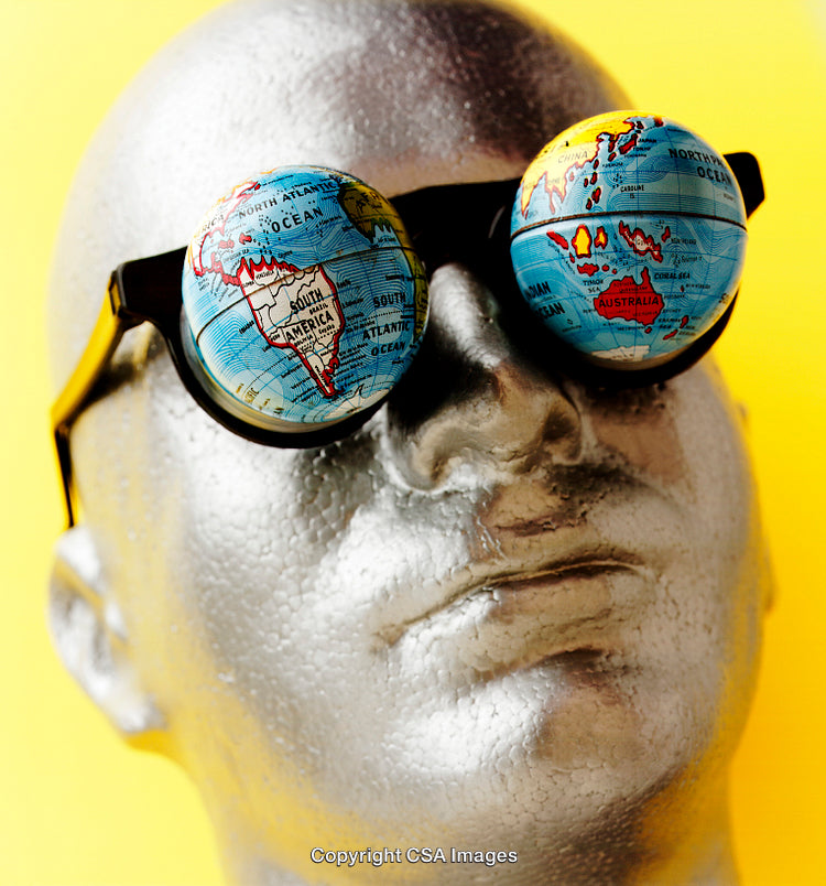 Creative Sculpture with Globe Eyeglasses and Vibrant Yellow Background