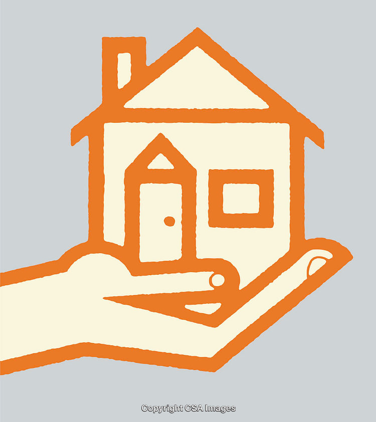 Hand Holding a House Symbolizing Homeownership and Security