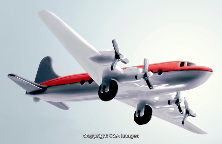 Retro Styled Plastic Toy Airplane with Propellers in Flight
