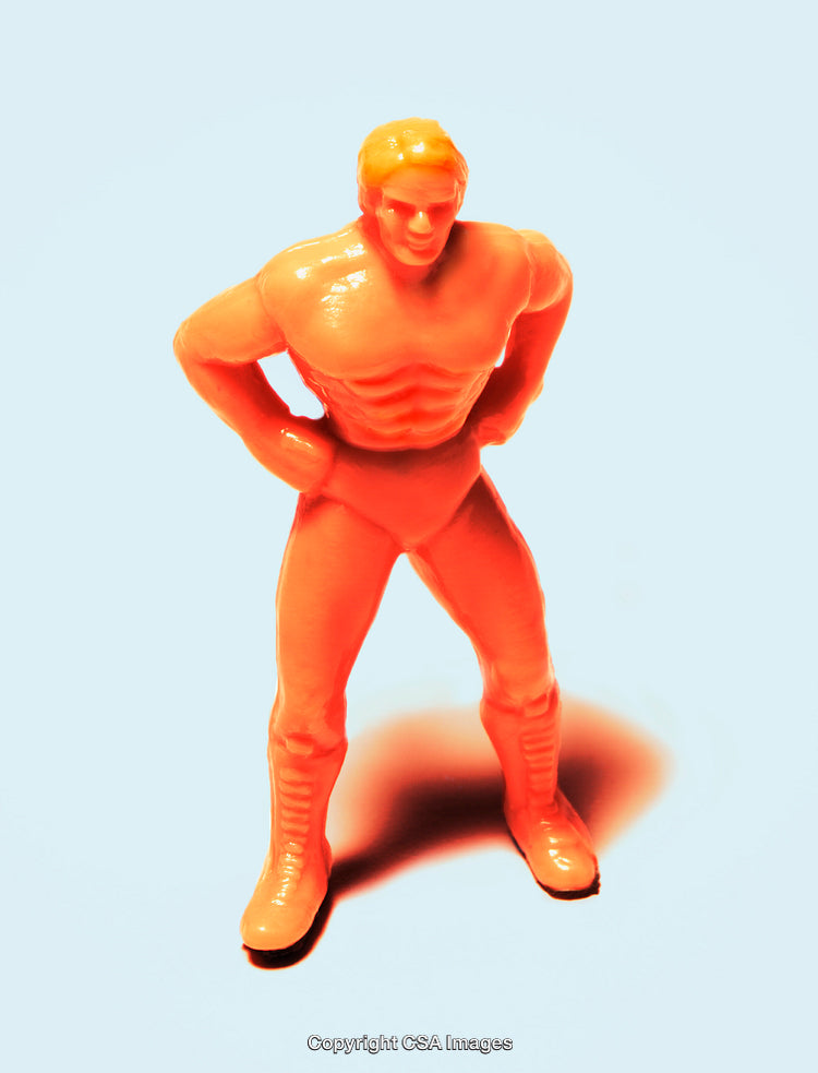 Close-Up of a Plastic Toy Figure Against Light Background