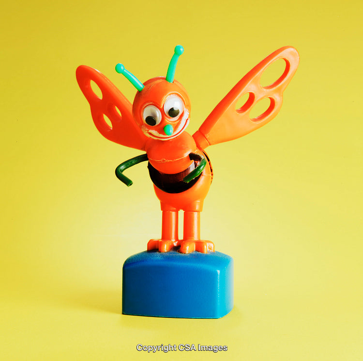 Colorful Plastic Toy Insect Over Bright Background with Playful Design