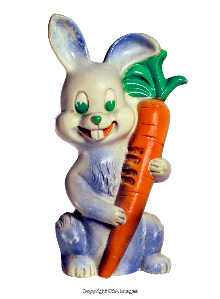 Colorful Rabbit Figurine Holding a Large Orange Carrot on White Background