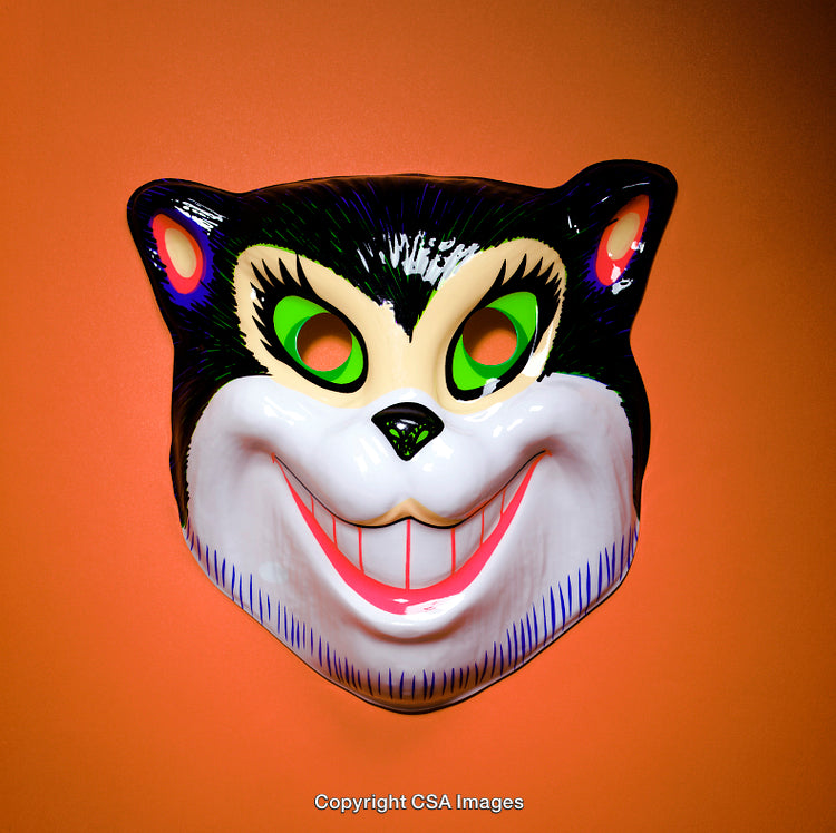 Colorful Cat-Themed Mask Against Bright Orange Background