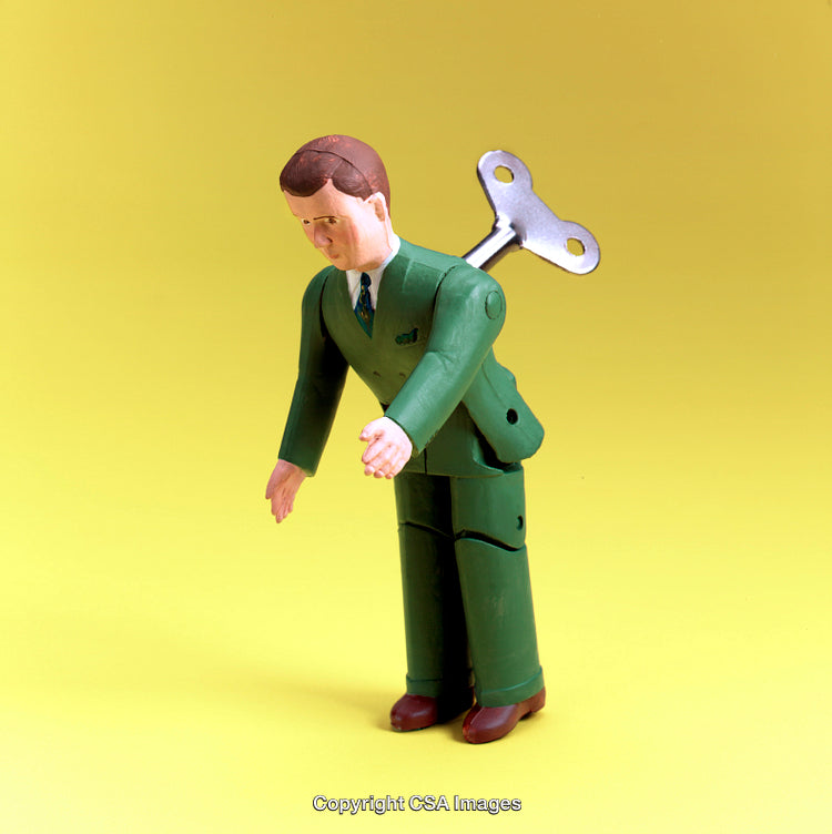 Wind-Up Toy Figure of a Man in Green Suit