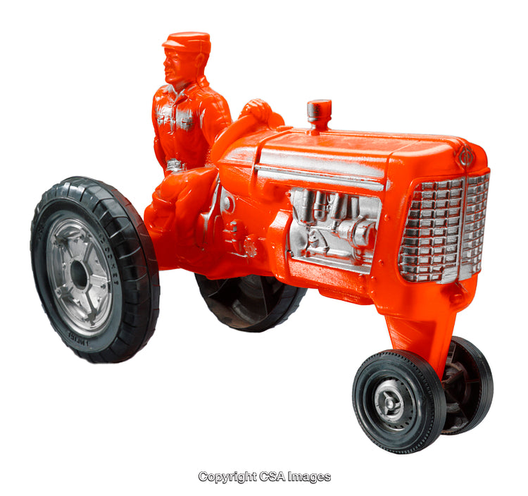 Bright Orange Vintage Toy Tractor With Demounted Wheels Isolated on White