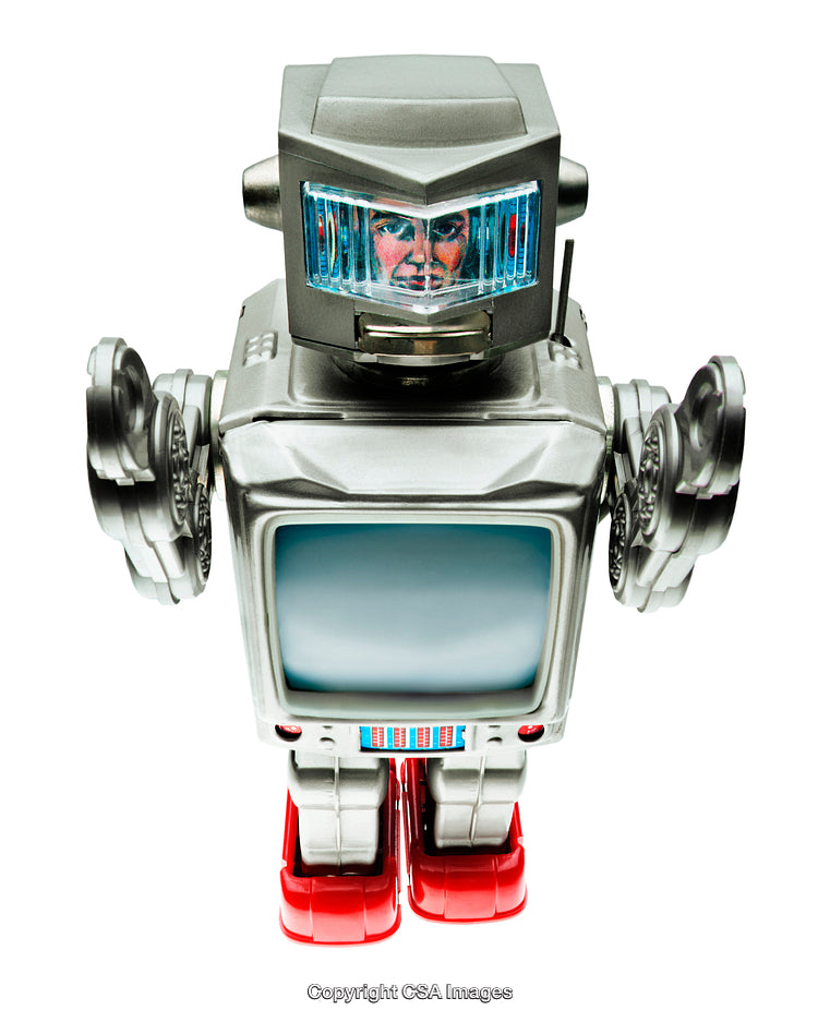 Retro Styled Silver Robot Toy with Red Feet and Human Face Feature