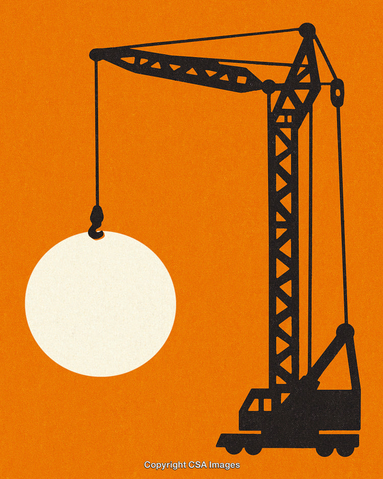 Silhouette of Crane With Wrecking Ball on Bright Orange Background