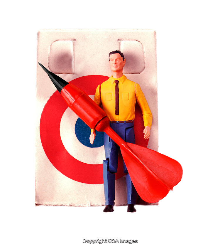Creative Concept With Plastic Toy Man on Red Target