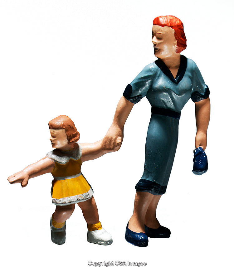Vintage Figurines of Woman and Child Depicting Nostalgic Family Connection