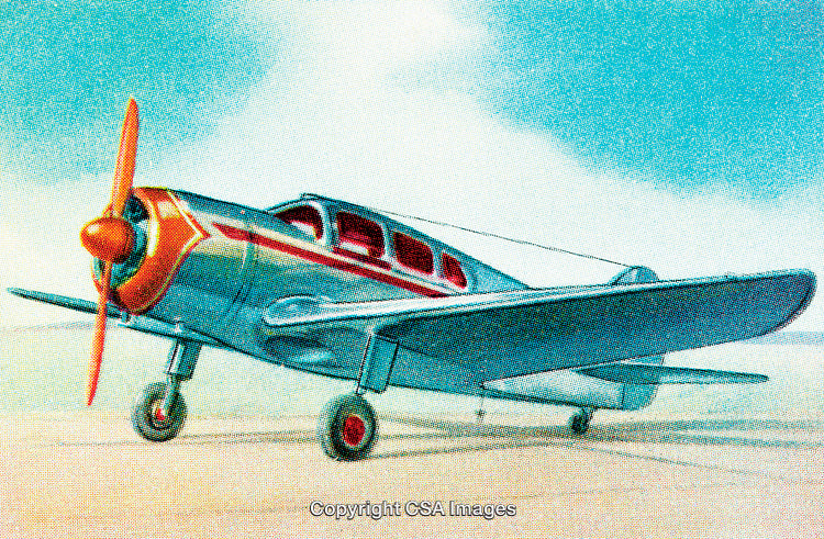 Retro Vintage Airplane Resting on Open Tarmac Under Clear Blue Sky