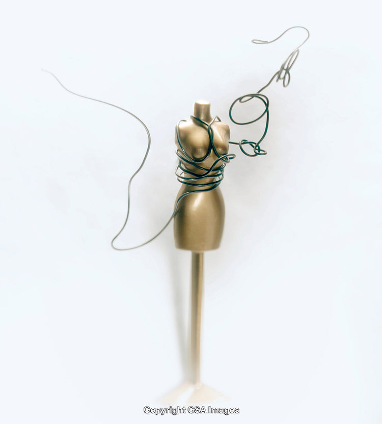 Golden Dress Form Decor with Artistic Wire Wrapping on White Background
