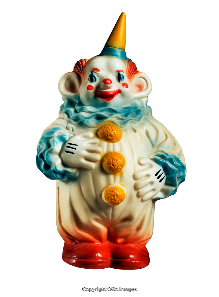 Vintage Clown Toy Figure With Painted Details and Bright Colors
