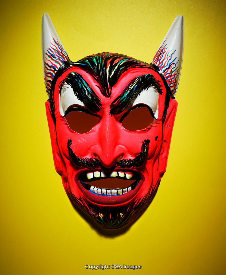 Colorful Devil Mask on Yellow Background with Bright Contrast