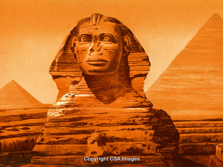The Great Sphinx and Pyramids Under a Golden Glow in Egypt