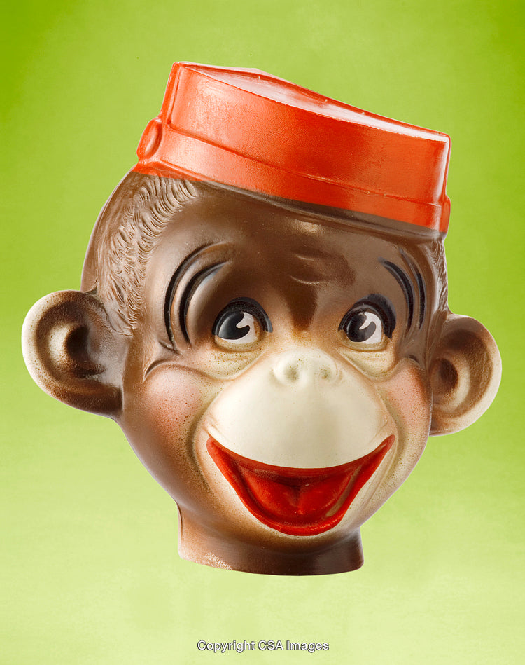 Detailed Close-Up of a Toy Figure with a Vibrant Green Background