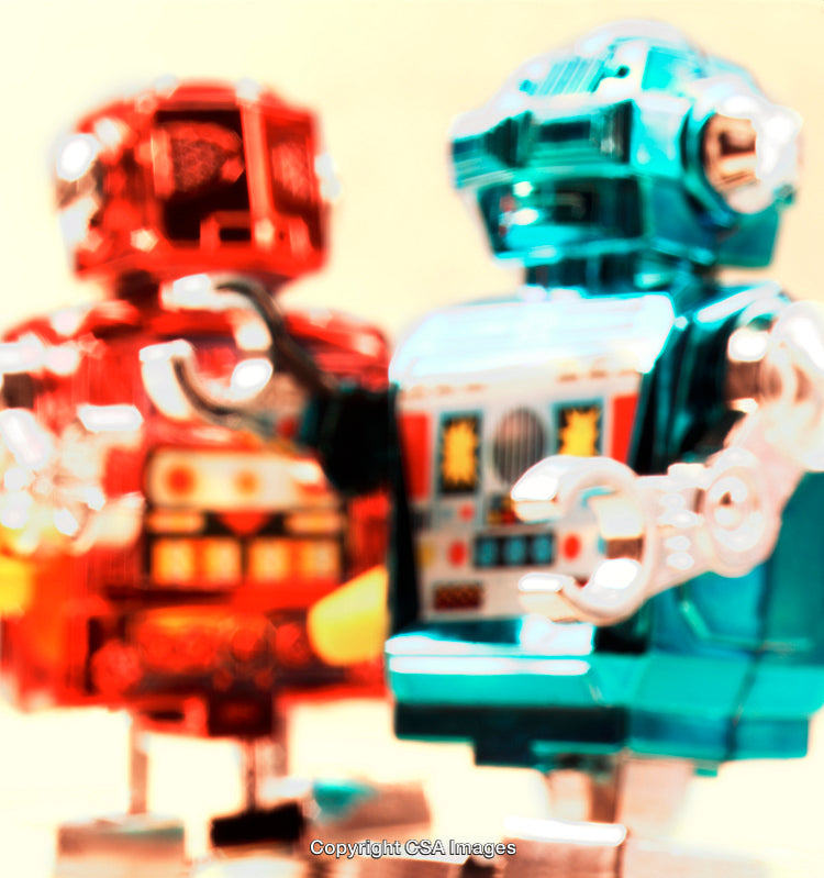 Close-Up of Two Retro Toy Robots in Vibrant Colors