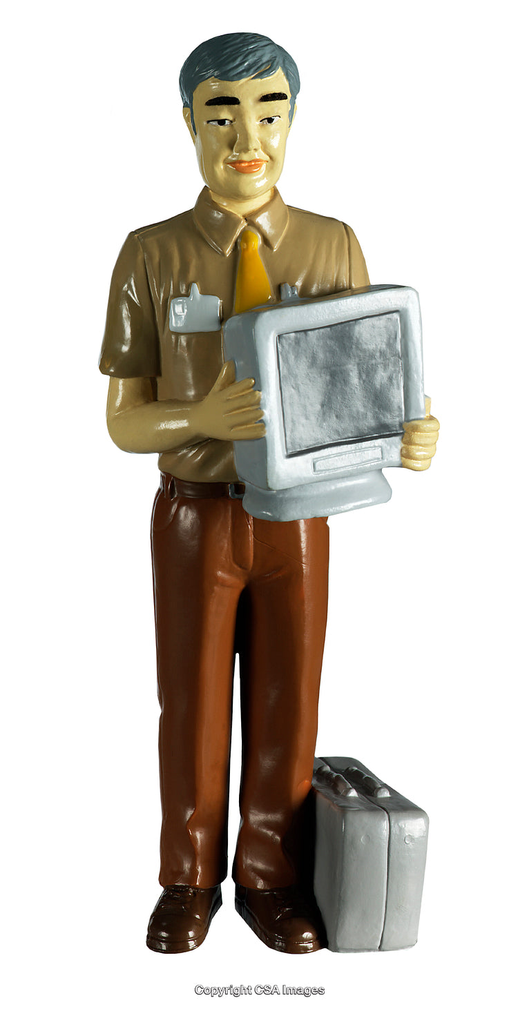 Plastic Figurine Holding a Desktop Monitor with a Briefcase Beside