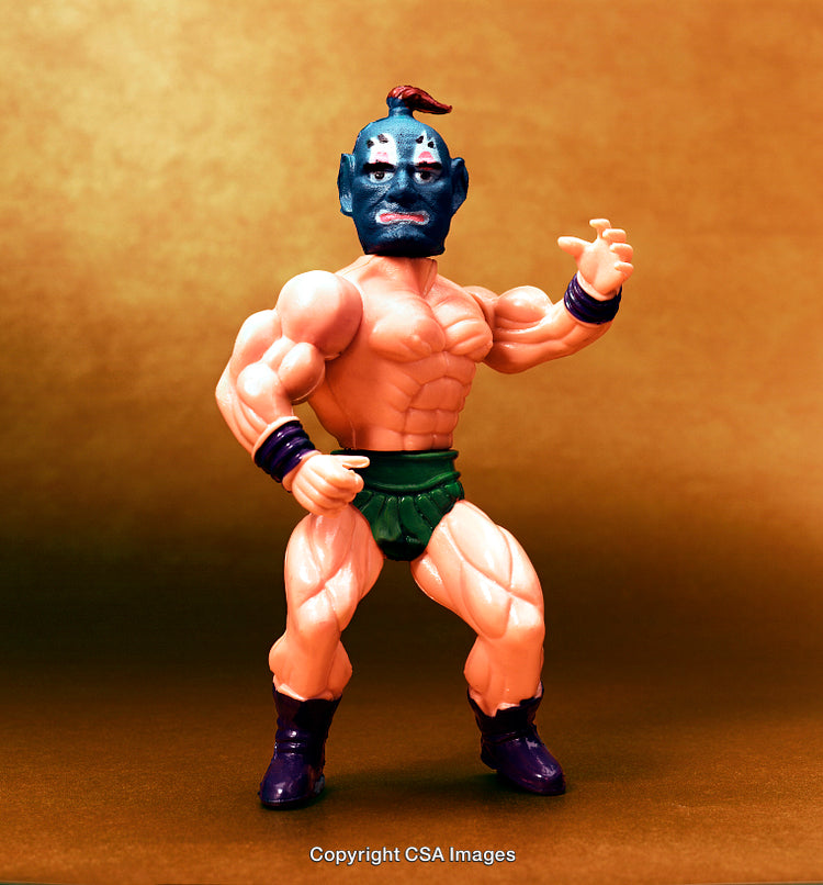 Colorful Plastic Action Figure Displayed Against Golden Background