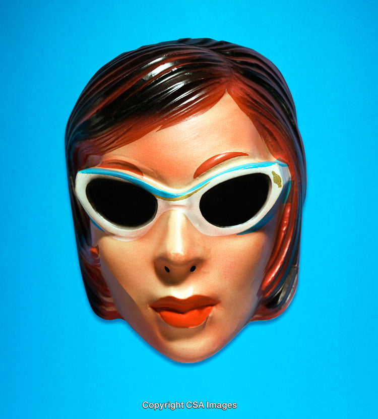 Vintage Plastic Female Mask with Sunglasses on Blue Background