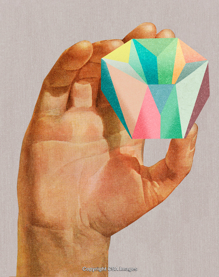 Hand Holding Multicolored Geometric Shape in Artful Stylized Composition
