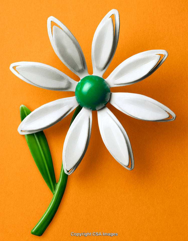 White Plastic Daisy on Vibrant Orange Background
