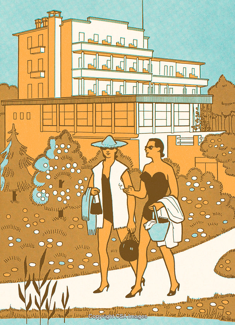 Stylish Women Walking in Front of an Elegant Art Deco Building