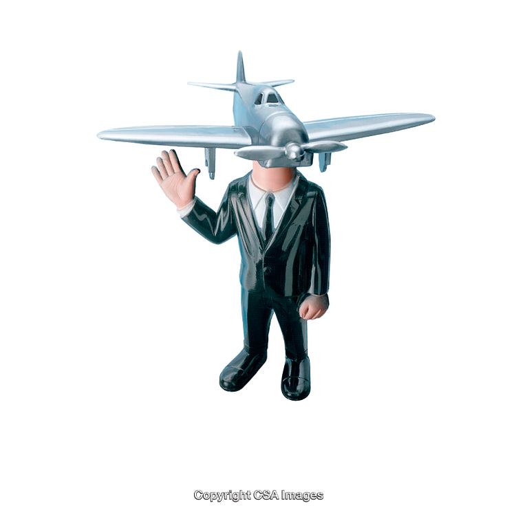 Creative Surreal Toy Model with Airplane Face and Black Suit