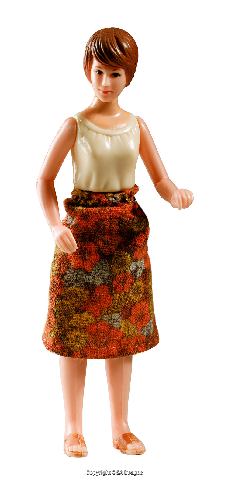 Vintage Female Figurine in Retro Attire with Floral Skirt