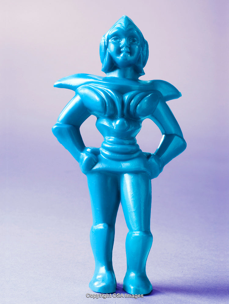 Blue Plastic Figurine With Sci-Fi Inspired Design on Gradient Background