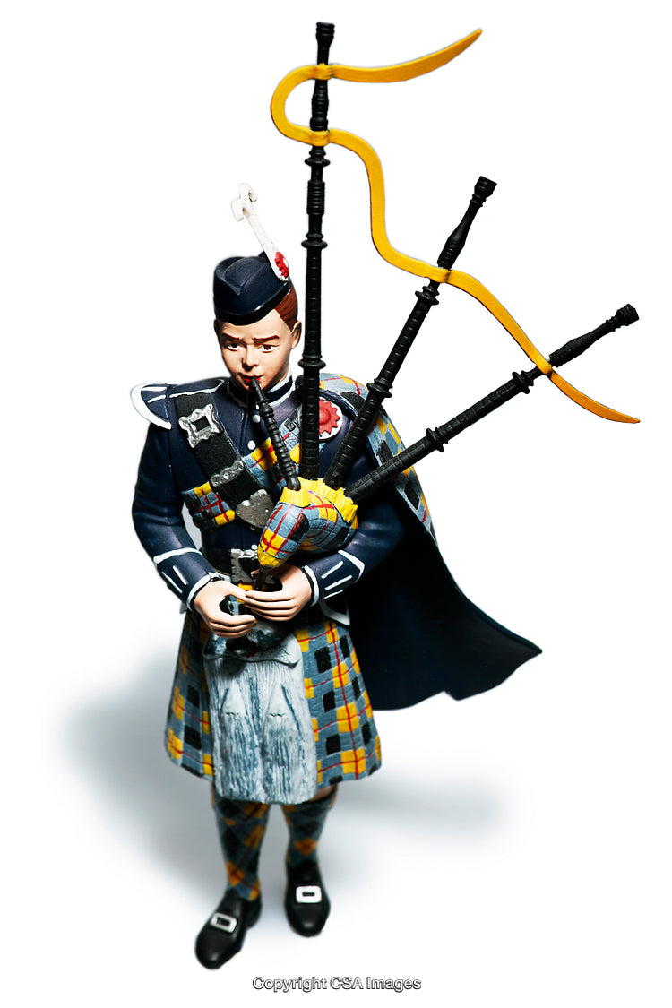 Scottish Highland Piper Figure with Traditional Bagpipes in Full Regalia
