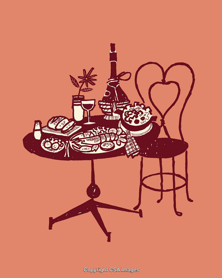 Rustic Styled Table Setting with Wine and Traditional Mediterranean Cuisine