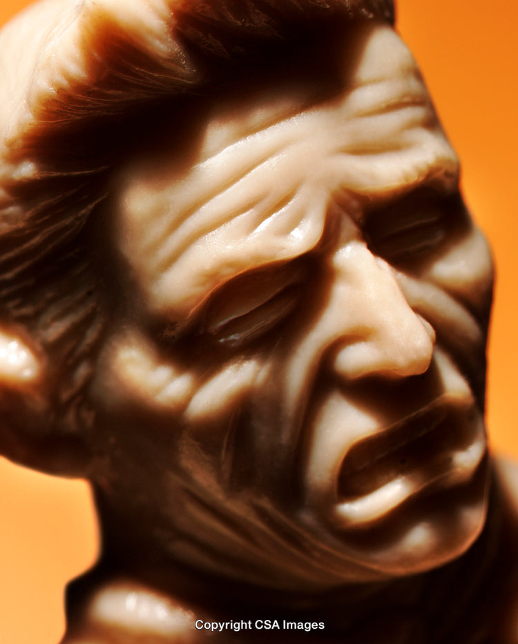 Close-Up Of A Distressed Face On A Sculpted Plastic Figure