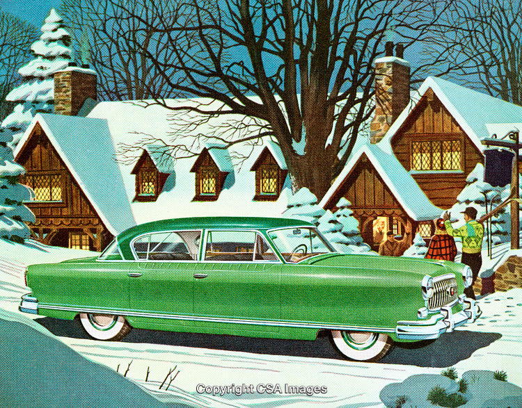 Classic Green Car by a Snow Covered House Amid Winter Pines