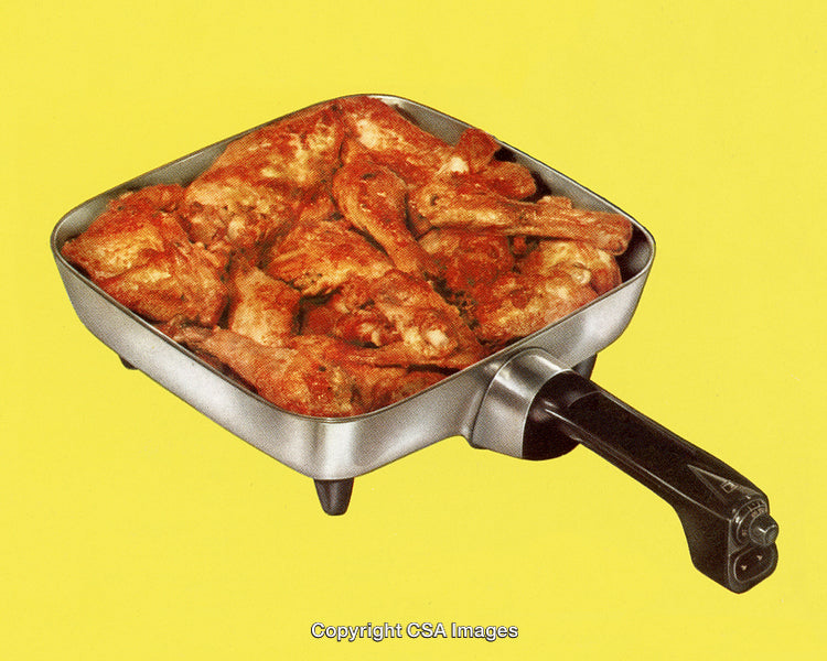 Vintage Skillet Cooking Chicken with a Retro Yellow Background