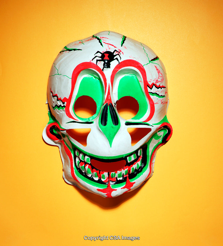 Colorful Painted Skull Mask with Vibrant Background