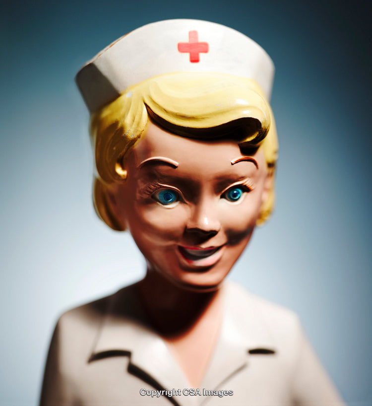 Close-Up of Vintage Nurse Figurine With Retro Design