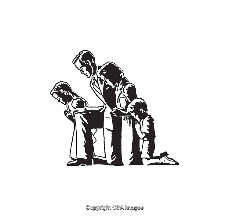 Silhouette of a Kneeling Family Engaged in Prayer Together