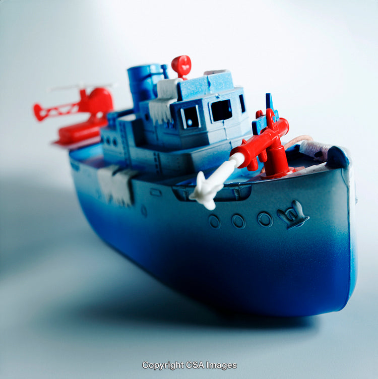 Blue Toy Ship With Helicopter Featuring Bright Red and White Accents
