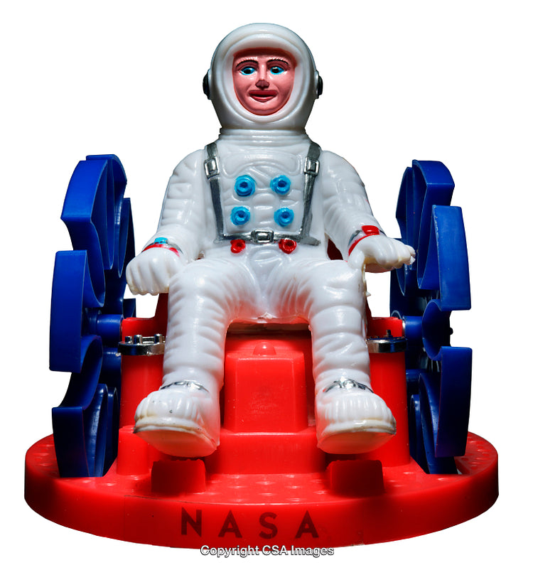Vintage Toy Astronaut Figure Sitting on Red and Blue Spacecraft Base