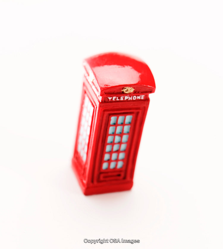 Red Toy Phone Booth Miniature on White Background