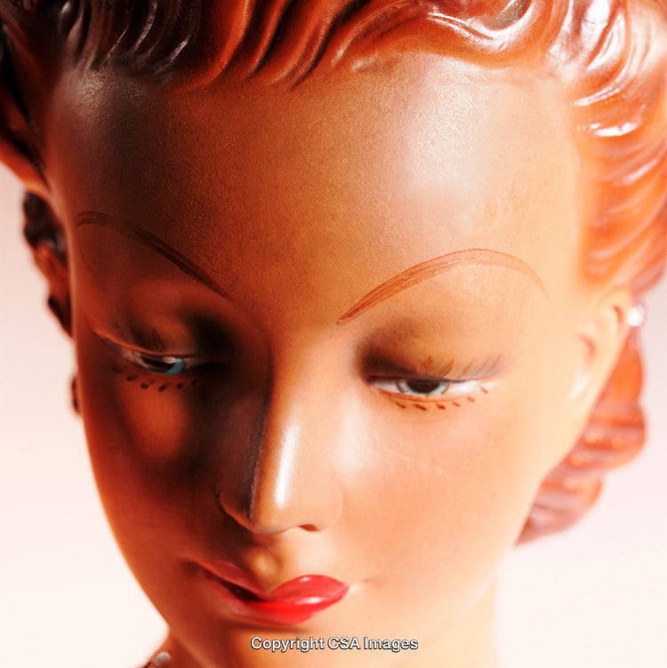 Close-Up of a Decorative Figurine with Intricate Details and Warm Colors