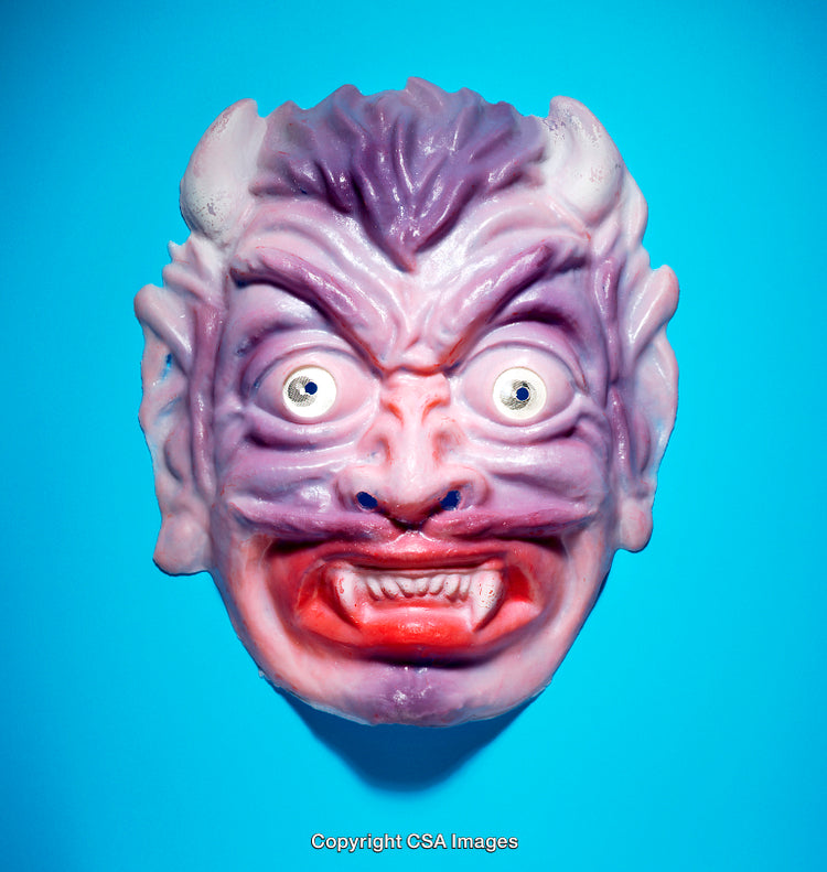 Colorful Monster Face Mask with Expressive Features Against Blue Background