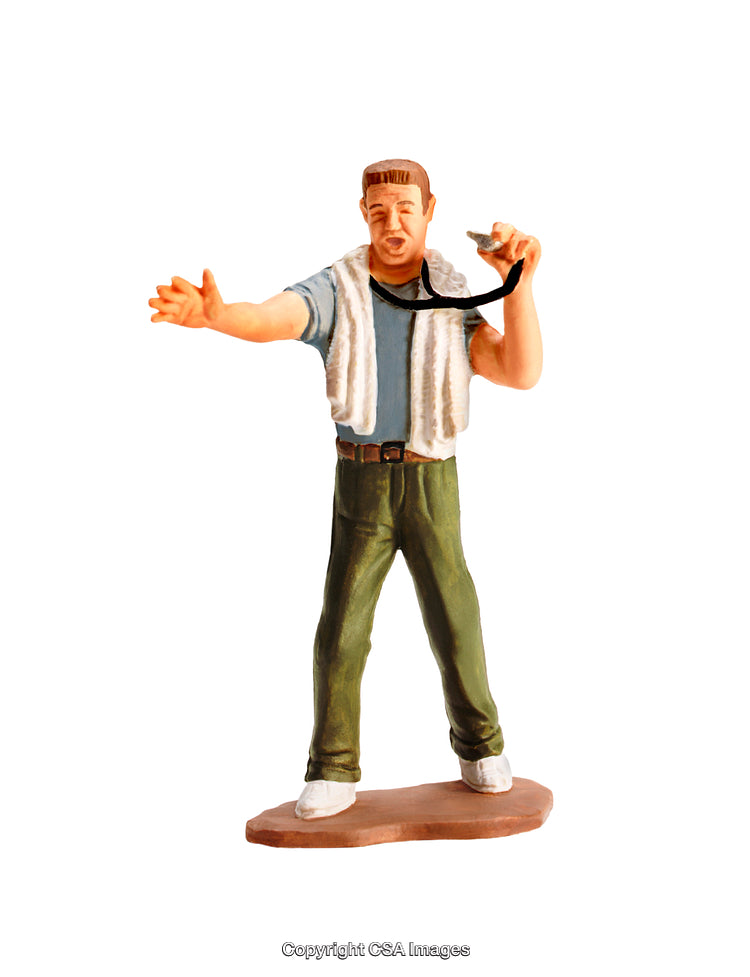 Plastic Toy Figure of a Whistling Coach with a Towel on His Shoulders