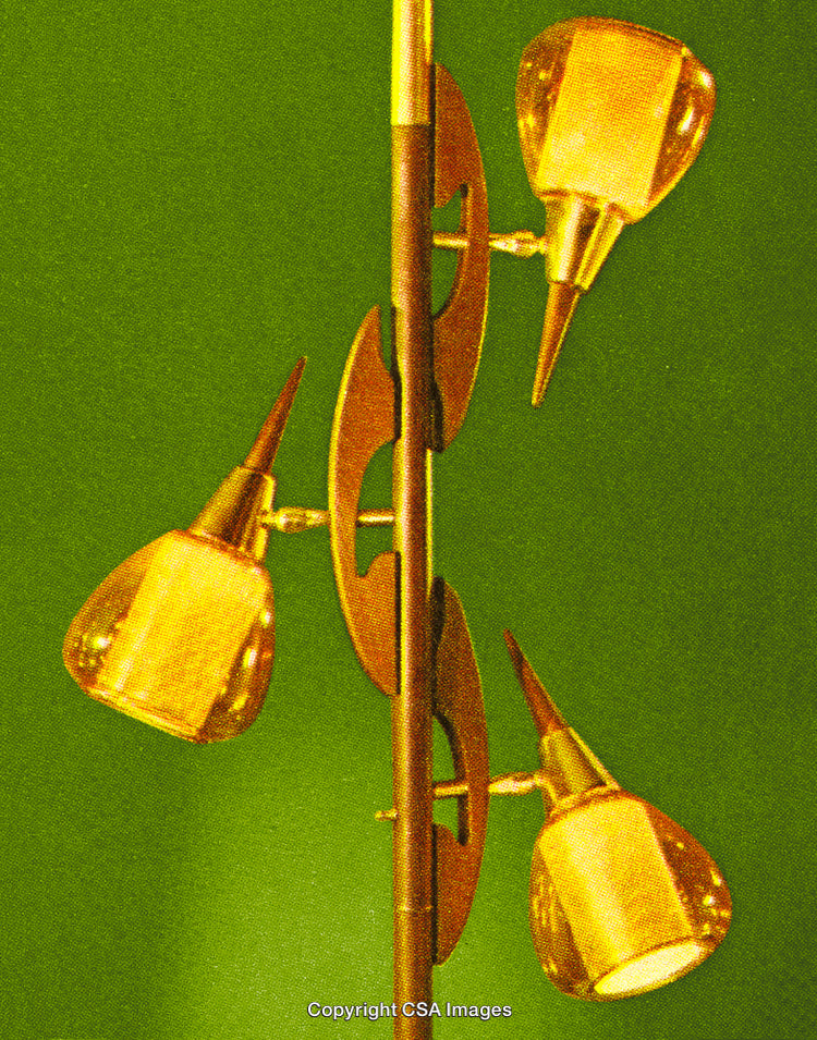 Vintage Golden Floor Lamp Against a Textured Green Background