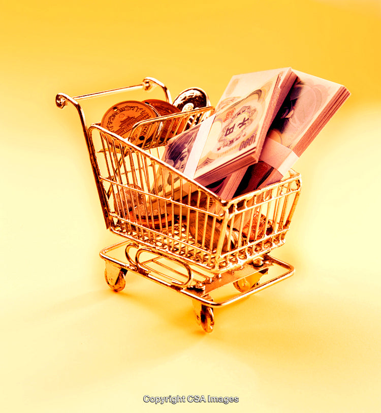 Golden Shopping Cart Filled With Coins and Banknotes on Yellow Background
