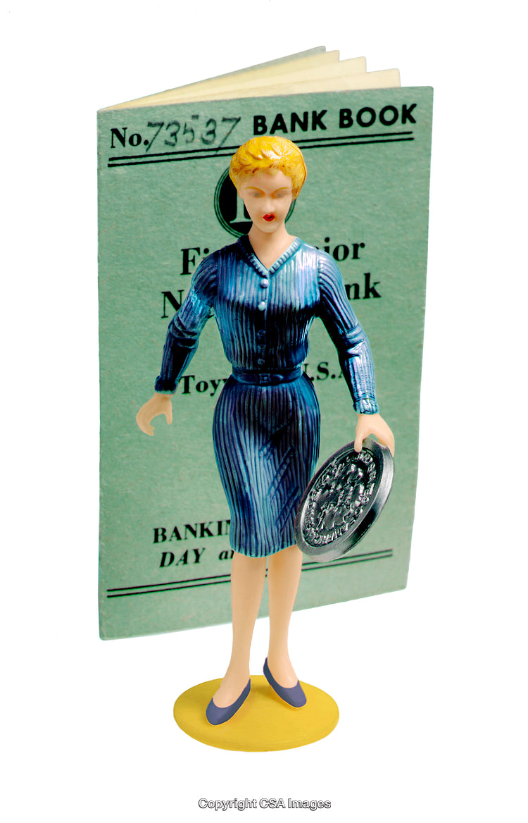 Vintage Toy Figure with Bank Book and Silver Decorative Coin