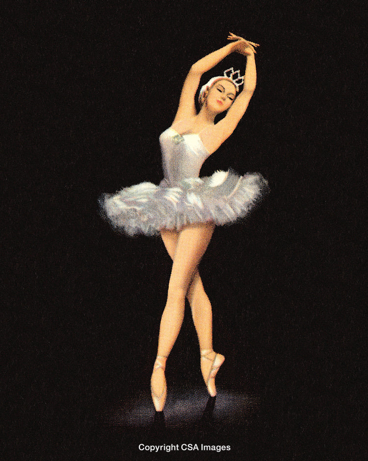 Elegant Ballet Dancer Performing in White Tutu on Dark Stage